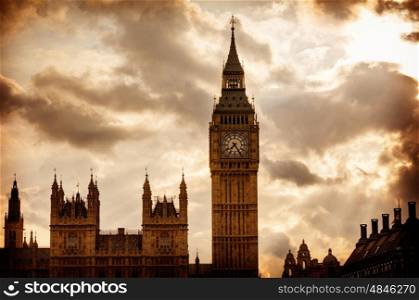 Big Ben Clock Tower in London sunset dramatic sky England