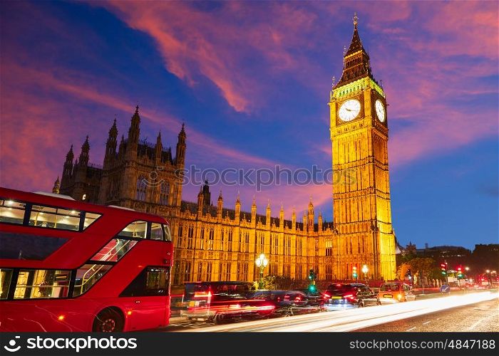 Big Ben Clock Tower with London Bus sunset in England