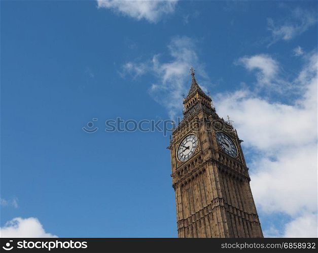 Big Ben in London. Big Ben at the Houses of Parliament aka Westminster Palace in London, UK - blue sky