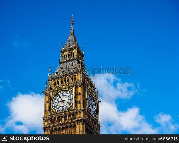 Big Ben in London (hdr). Big Ben at the Houses of Parliament aka Westminster Palace in London, UK - blue sky (high dynamic range)