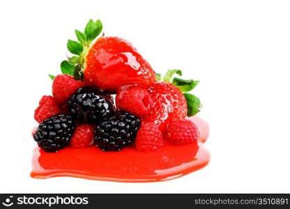 big berry pile in syrup isolated on white