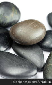 big black spa stones isolated on white