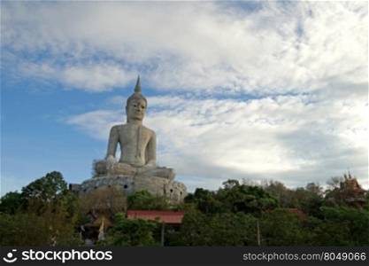 big buddha image under construction with beautiful sky background