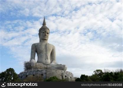 big buddha image under construction with beautiful sky background