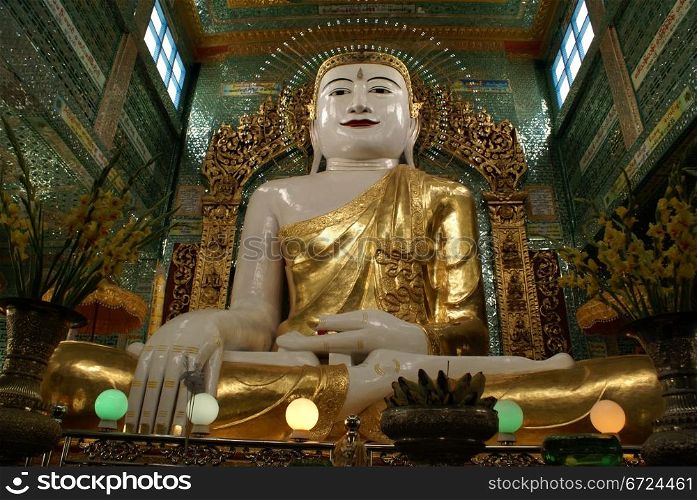 Big buddha in buddhist temple on Sagaing Hill, Mandalay, Myanmar