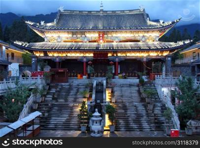 Big buddhist temple at night in Dali, China