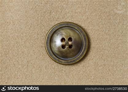 Big button fixed on fabric background