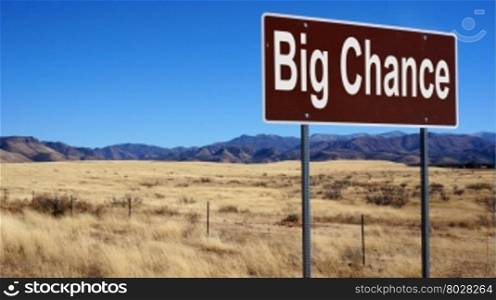 Big Chance road sign with blue sky and wilderness