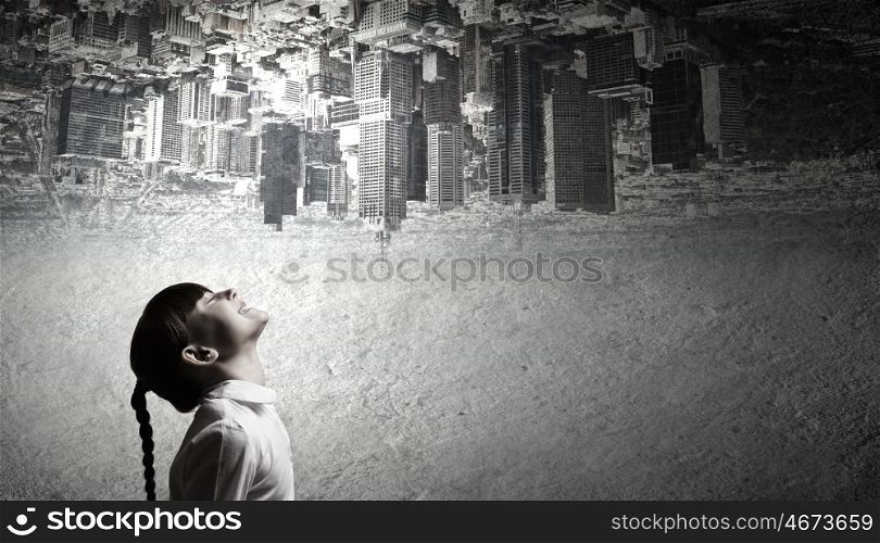 Big city life. Side view of cute girl and image of big city