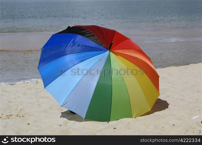 Big color umbrella on the beach in Cherating, Malaysia
