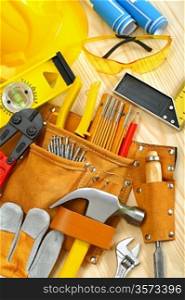 big composition of working tools on wooden boards