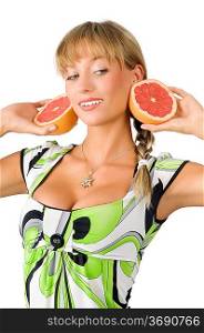 big earings of grapefruit on a nice and young woman with green dress