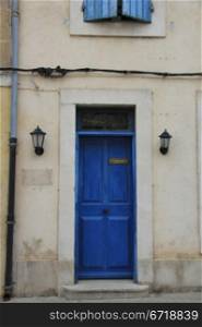 Big frontdoor of a Provencal house in France