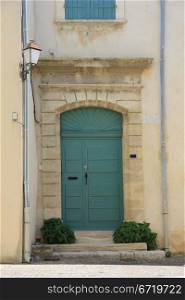Big frontdoor of a Provencal house in France
