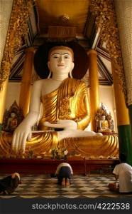 Big golden Buddha in Shwedagon Paya, yangon, Myanmar