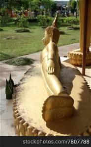 Big golden sleeping Buddha in monastery, Vientiane, Laos
