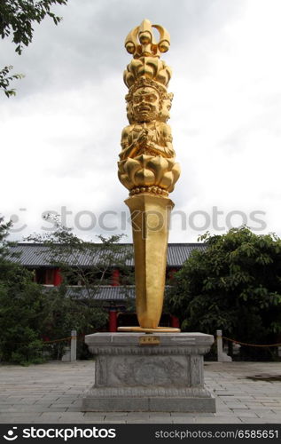 Big golden vajra in monastery ChongSheng in Dali, China