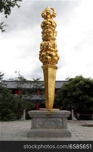 Big golden vajra in monastery ChongSheng in Dali, China