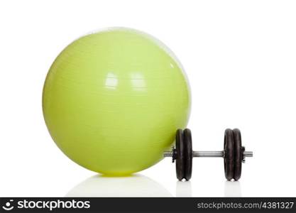 Big green training ball and dumbbell isolated on a white background