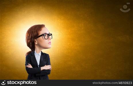 Big head. Funny young businesswoman with big head wearing glasses