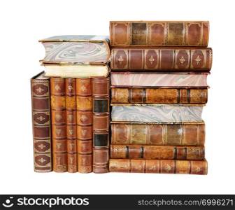 Big heap of antique books in a leather hardcover isolated on white background