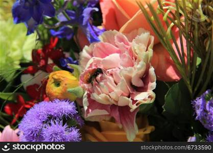 Big honey bee in a floral arrangement