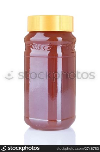 big jar of homemade honey isolated on white background