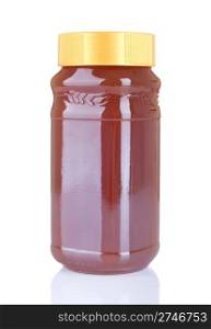 big jar of homemade honey isolated on white background