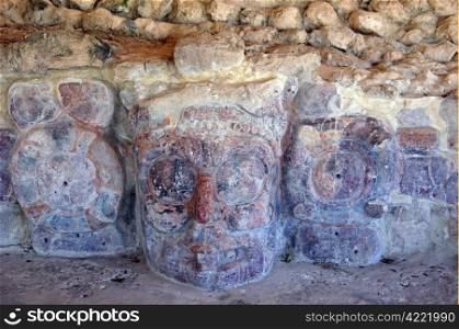 Big mask of mayan god in Edzna ruins near Campeche, Mexico