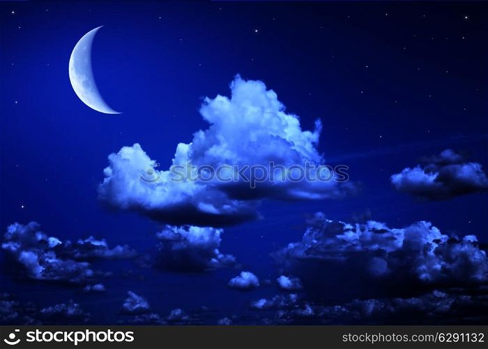 Big moon and stars in a cloudy night blue sky. fantastic beautiful landscape