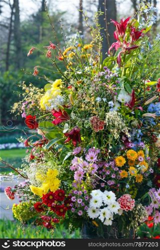 Big multicolor wonderful flowers bouquet on spring park