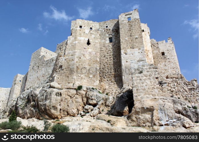 Big old castle Masyaf on the hill in Syria