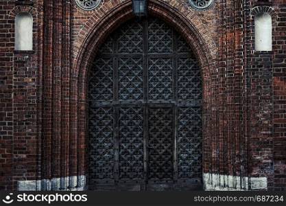 Big old wooden gates to a Gothic castle or cathedral (high details and hdr effect)