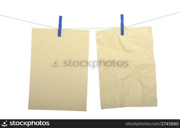 big paper notes hanging on wire with clothespin (isolated on white background)