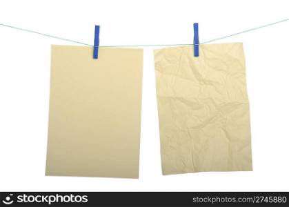 big paper notes hanging on wire with clothespin (isolated on white background)