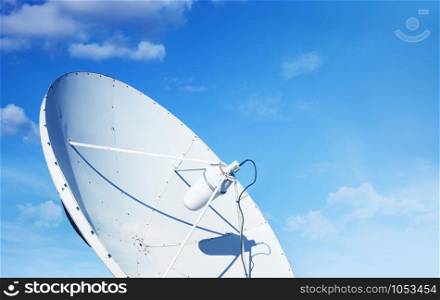 Big parabolic satellite antenna for telecommunications on a background of blue sky.. White big parabolic satellite antenna for telecommunications on a background of blue sky.