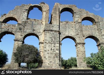Big part of ancient aquaduct in Aspendos, Turkey