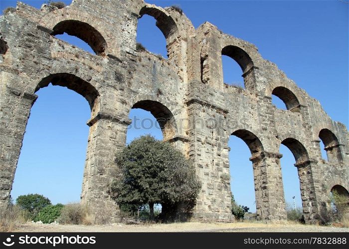 Big part of ancient aquaduct near Aspendos, Turkey