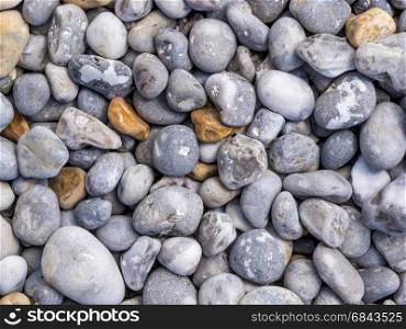 Big pebbles of different colors and size.