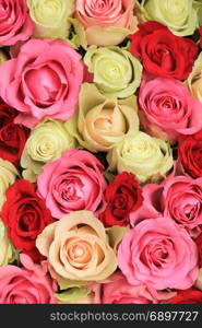 Big pink mixed roses in a floral wedding decoration