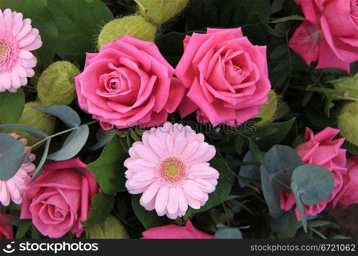 Big pink roses and soft pink gerberas in a flower arrangement
