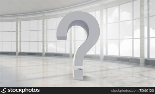 Big question mark. Bright modern interior with big question mark sign