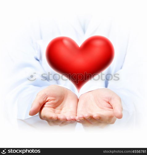 big red heart. A Big Red Heart in thehand of a person