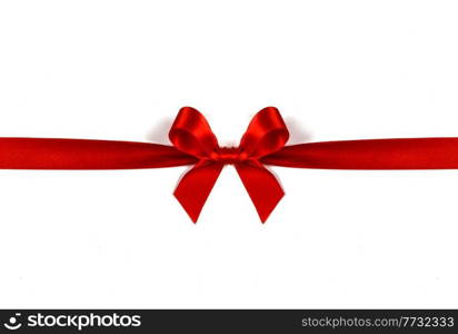 Big red satin bow isolated on white background. Christmas holiday gift concept. Red bow on white background