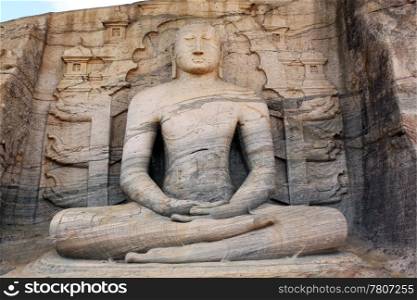 Big sitting Buddha and rock in Polonnaruva, Sri Lanka