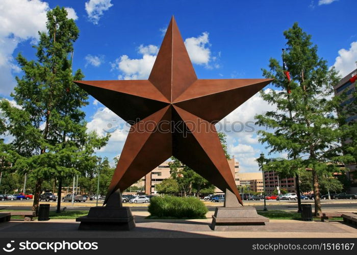 big star decorated in the city against blue sky in austin, texas, usa .