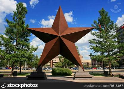 big star decorated in the city against blue sky in austin, texas, usa .