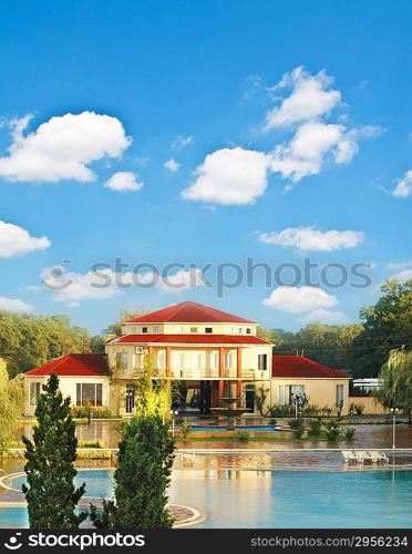 Big summer house with swimming pool in summer