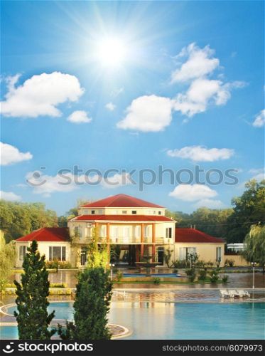 Big summer house with swimming pool in summer