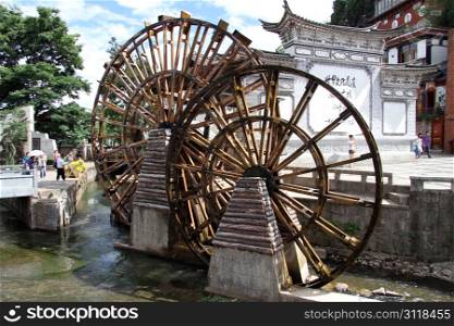 Big water wheels on the square in Lijiang, China